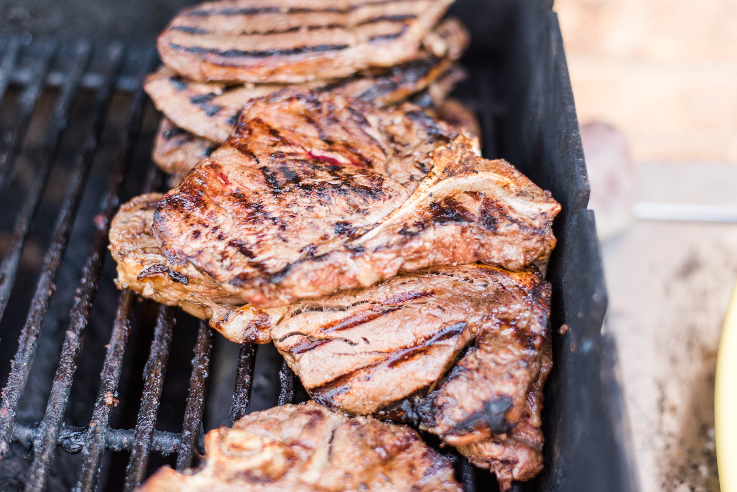 t-bone steak, grass-fed beef, hot off the grill, 